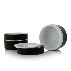 Hũ đựng kem body K 100g màu trắng/đen viền vàng có nắp lót