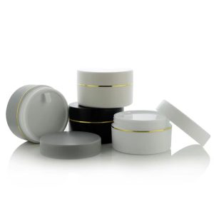 Hũ đựng kem body K 100g màu trắng/đen viền vàng có nắp lót